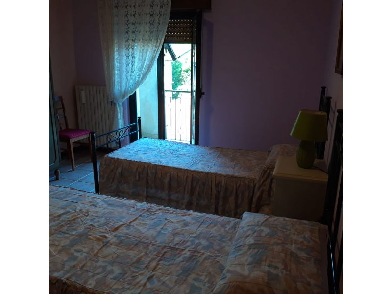 Stanza da letto con singoli laterale